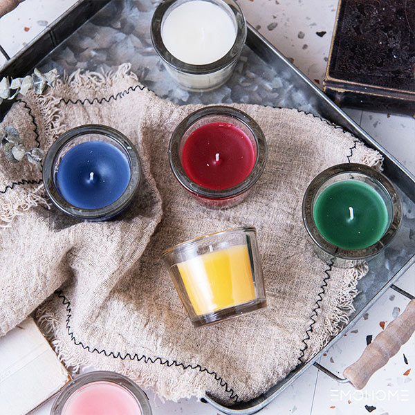 Briefly describe the difference between scented candles and traditional candles
